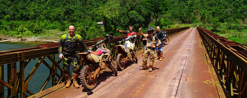 Ian & Co having a break on The Iron Bridge, on the way to Koh Kong