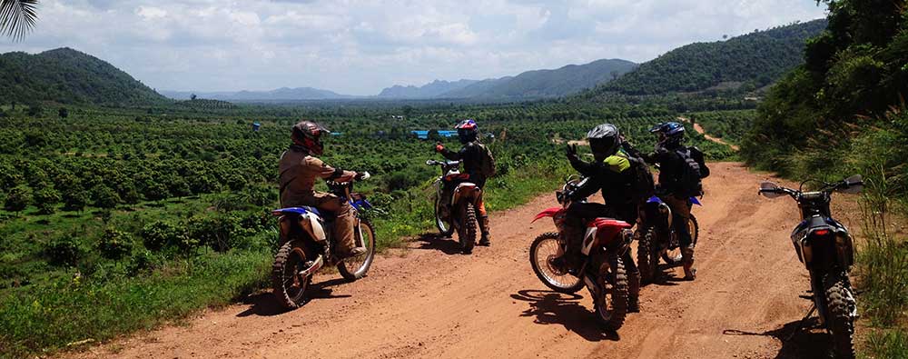 Stopping to admire the view on Phnom Voar [Vine Mountain]