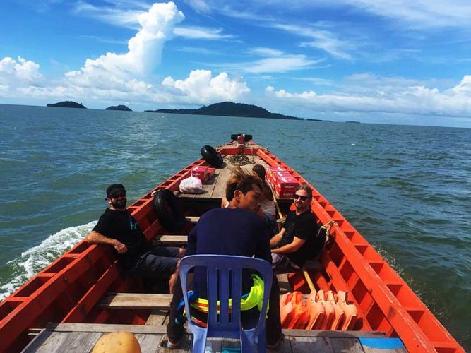 dirt-bike-tours-cambodia-boat