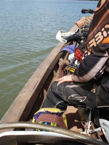 dirt-bike-tours-cambodia-boat